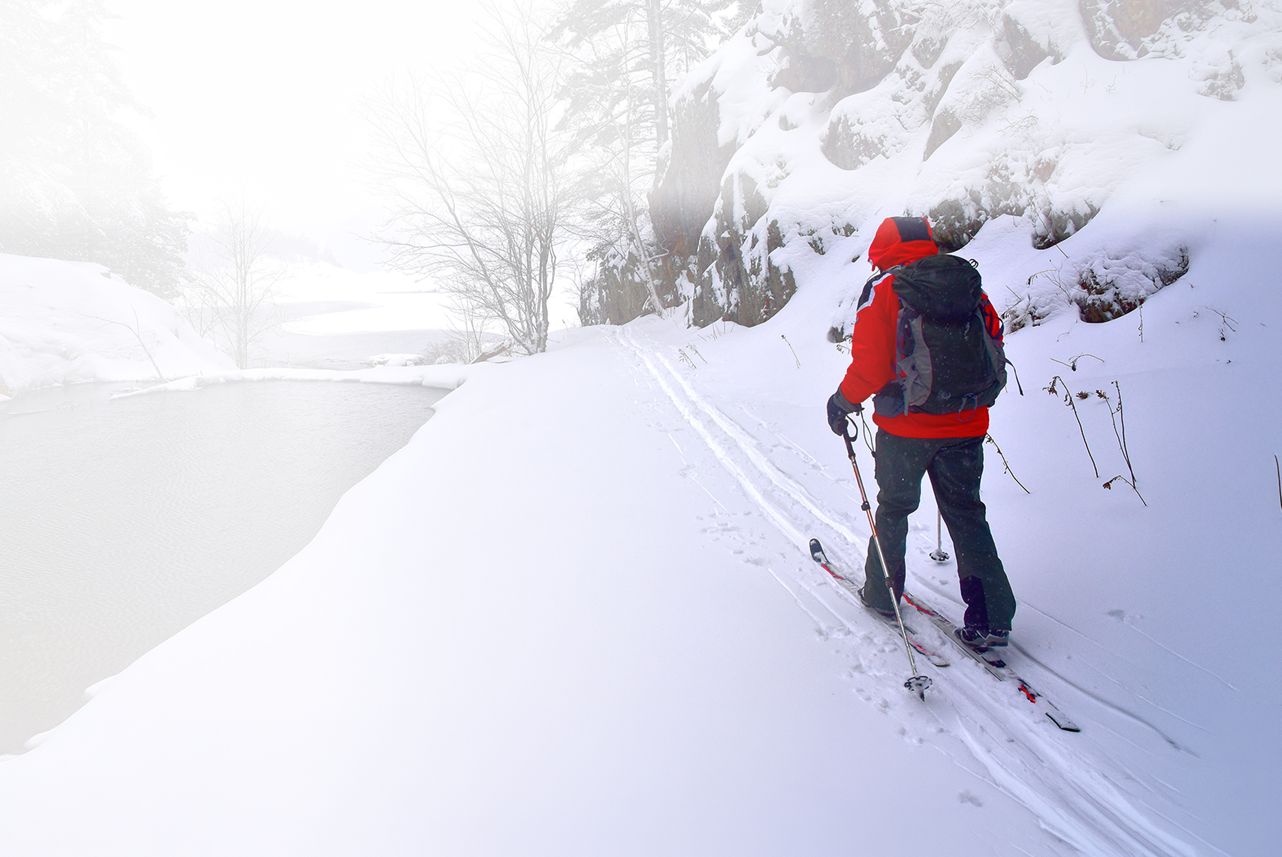 Photo: Person skiing in a wintery scene